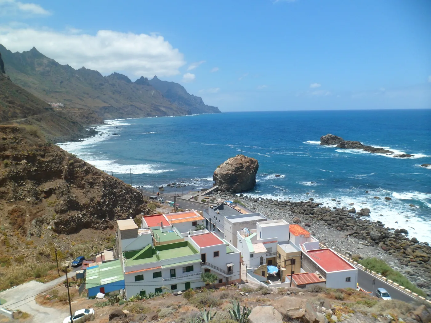 The Roque de las Bodegas rock off the Taganana coast, Tenerife, with the beach below the cliffs.