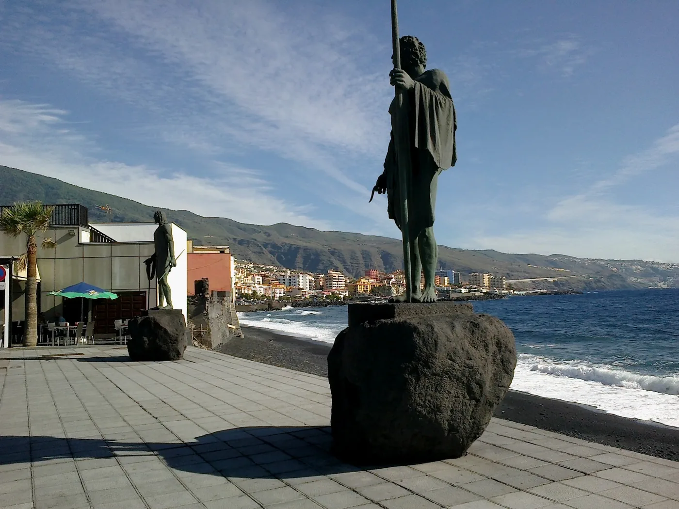 Bronze statues of the Guanche menceyes facing the sea at Candelaria, Tenerife.