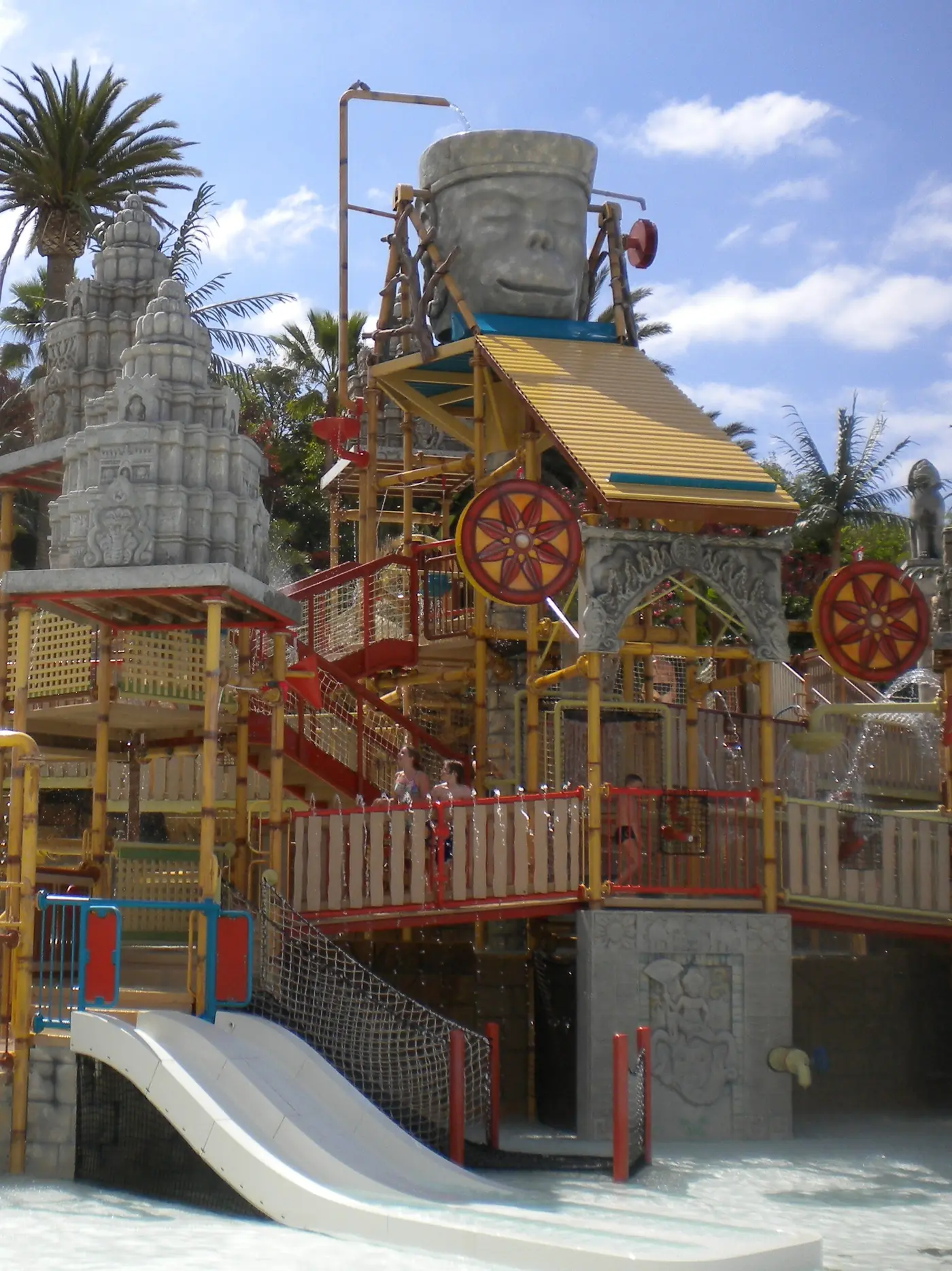 Slides, walkways and a tipping bucket in a Siam Park play area.
